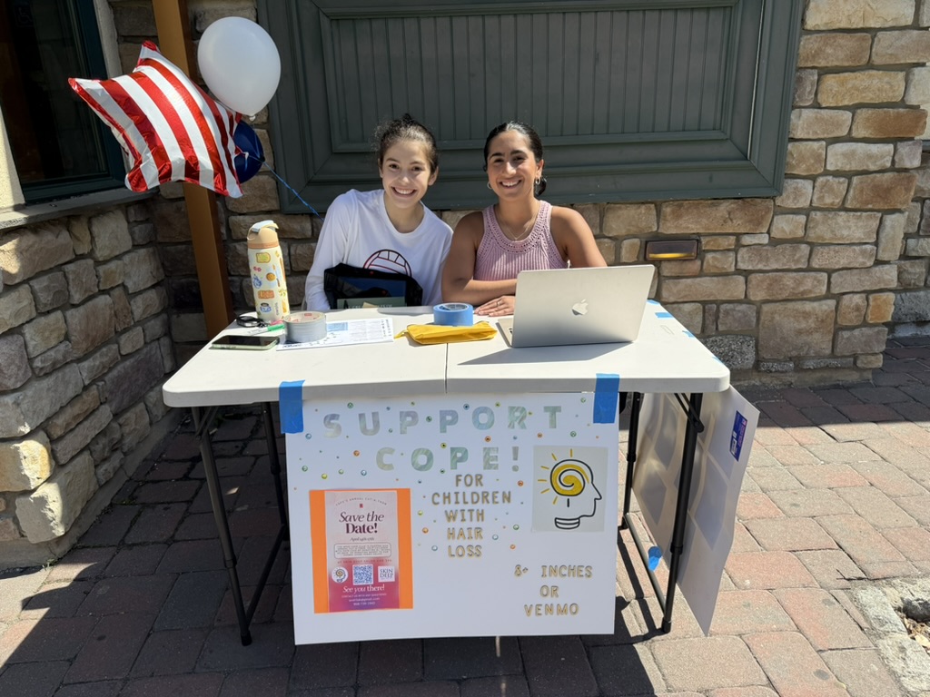 COPE members at the Reverend Caldwell Day fundraising table outside the Prestige Diner